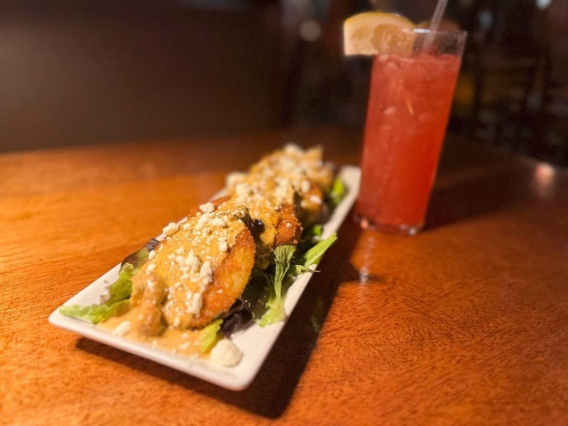Fried green tomatoes with a crawfish cream and goat cheese