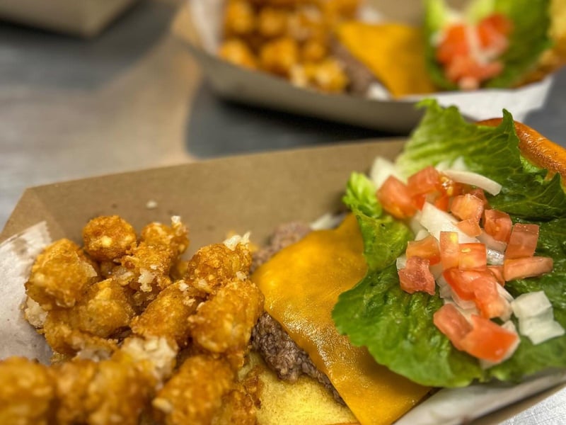 The cheeseburger with tater tots at Camilles at Crystal Beach