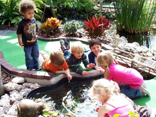 Children playing at The Fish Hole Golf on Anna Maria Island, FL
