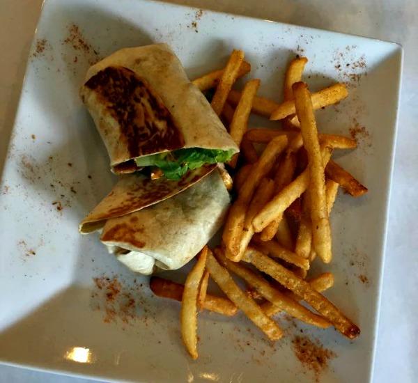chicken wrap and fries at Little New Orleans restaurant in Orange Beach
