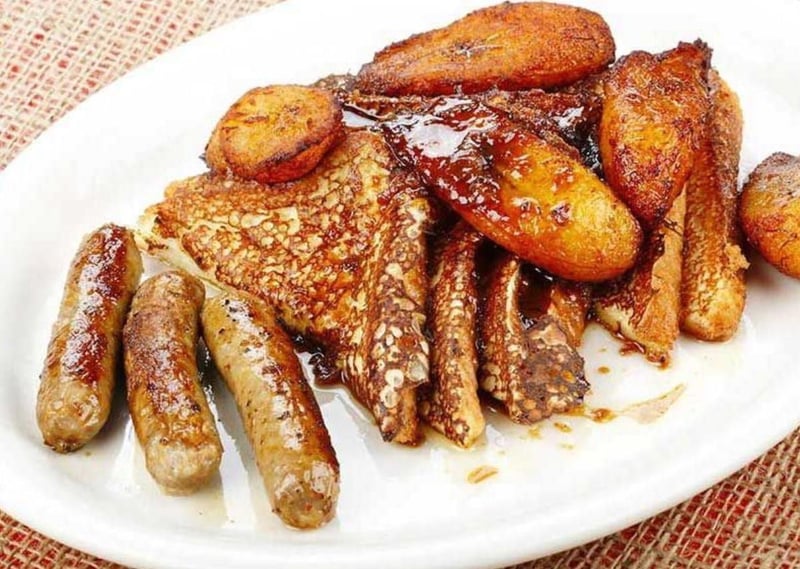 Delicious breakfast  french toast wiht sausage and home fries