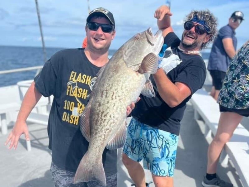 A man with his catch on board American Spirit