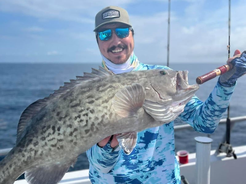 A man with his catch off the coast of Destin, Florida