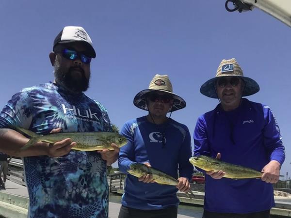 Anglers showing off their catches