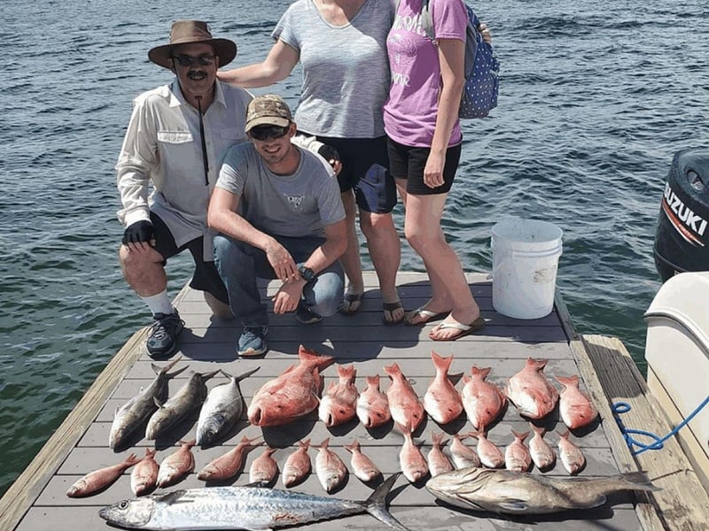 Anglers with their catches from a trip wtih Southern Charm Fishing Charter