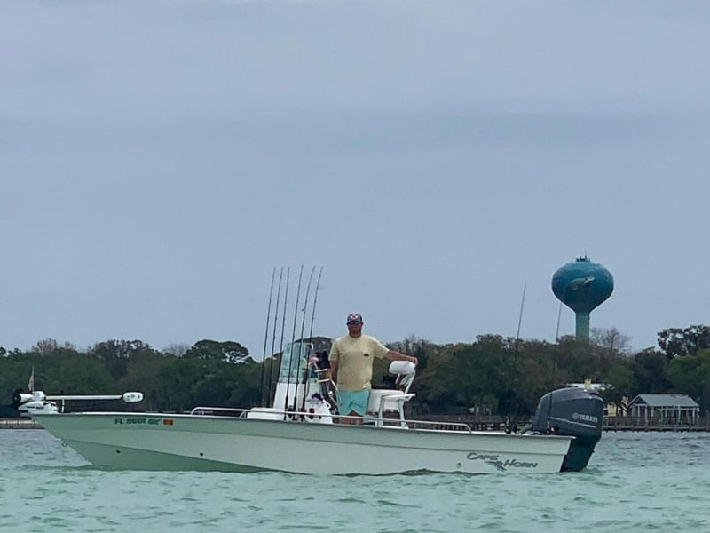 A man on Strictly Fishing on the water in Santa Rosa Beach, Florida