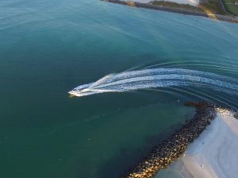 Overhead view of a private boat tour on the water in Sarasota, Florida