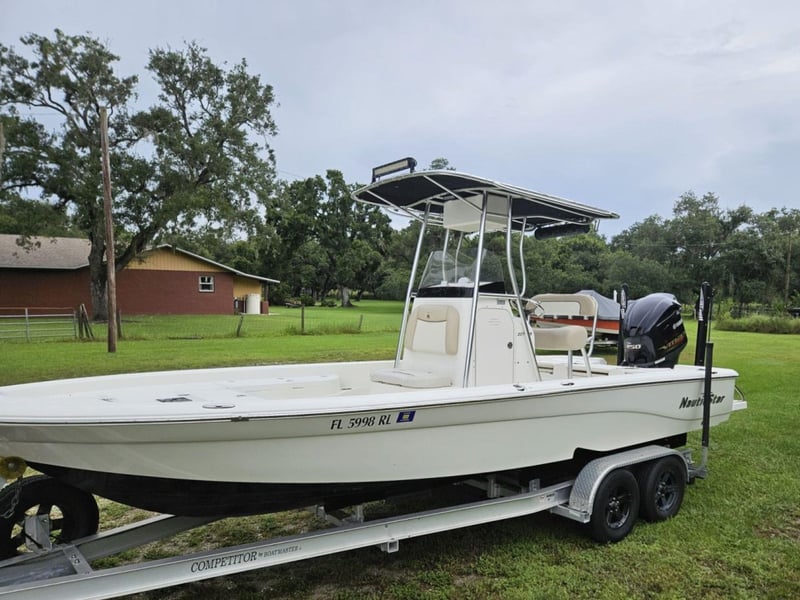 The Reel Knowledge Fishing boat on land in Saraosta, Florida