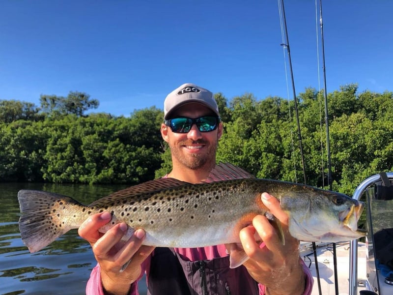 A man showing off his catch with James Gibson Charters LLC