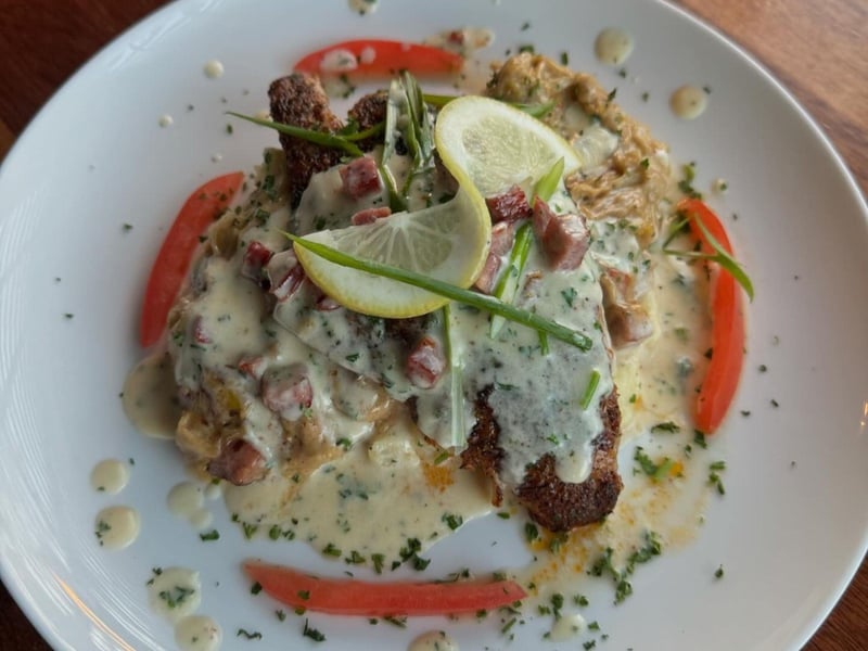 Blackened Mahi on a plate at Dharma Blue