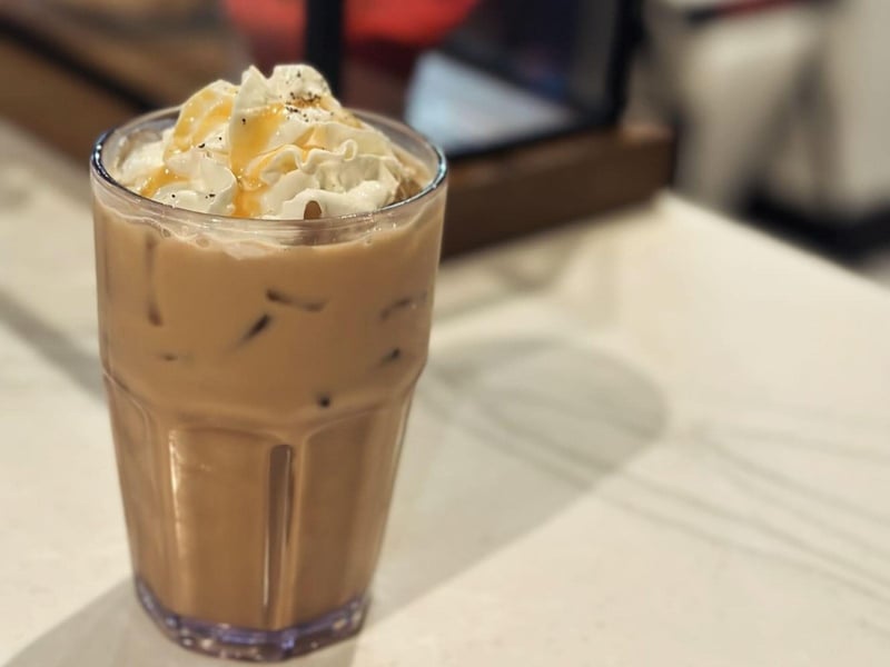 An iced coffee with whipped cream from Native Cafe in Pensacola Beach, Florida