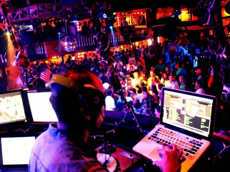 A DJ and the crowd in Phineas Phoggs at Seville Quarter