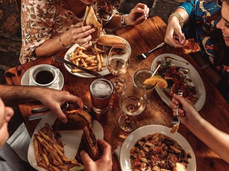 An overhead view of a table spread at Seville Quarter in Pensacola, Florida