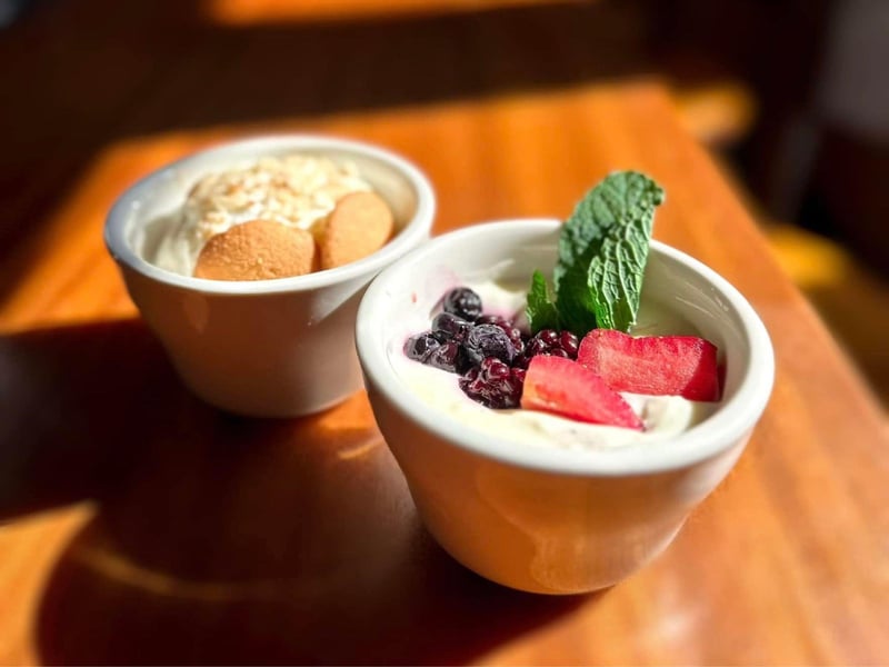 Two desserts on the counter at Five Sisters Blues Cafe
