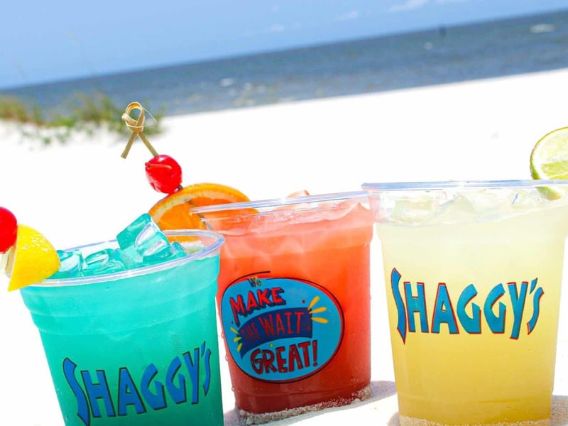 Three drinks on the beach at Shaggys in Pensacola Beach, Florida