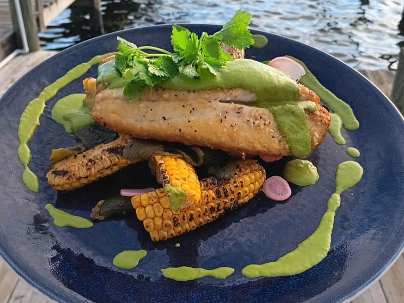 A fresh seafood dish with corn from The Grand Marlin in Panama City Beach, Florida