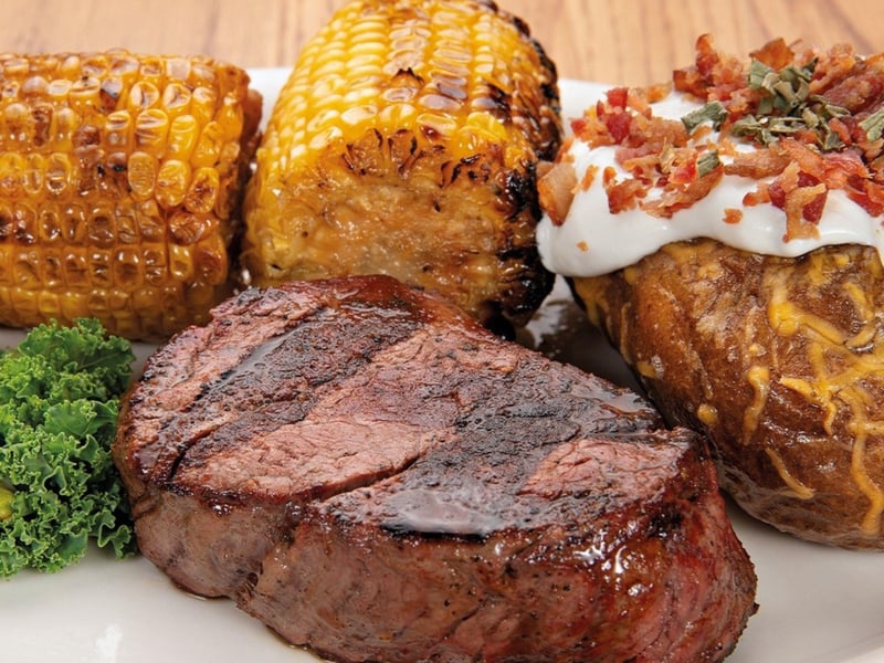 A steak with potatoes and vegetables from Angelos Steak Pit