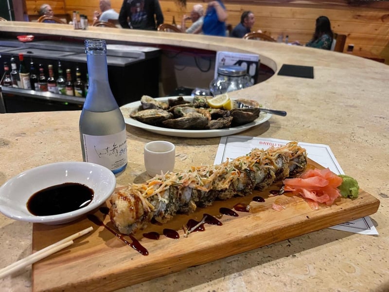 The menu features specialty sushi rolls