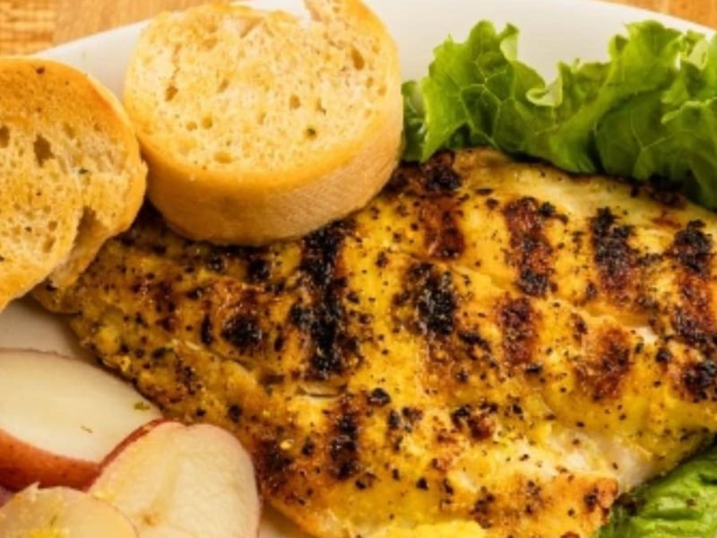 Billys fish of the day with coleslaw, corn and garlic bread