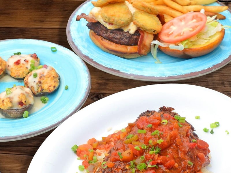 A table with entree plates at Hammerhead Freds