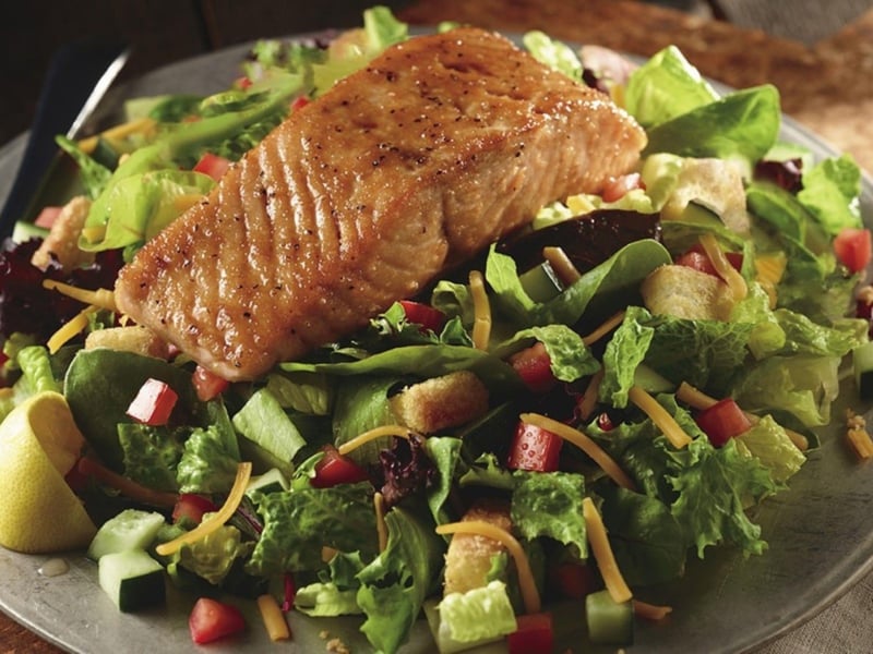 The farm fresh field salad with grilled salmon from Longhorn Steakhouse
