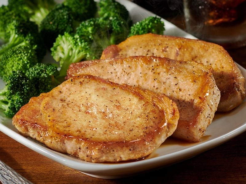 Cowboy pork chops with steamed broccoli