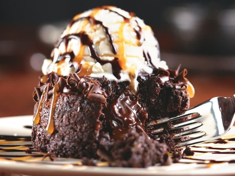 The molten lava cake with vanilla ice cream at Longhorn Steakhouse