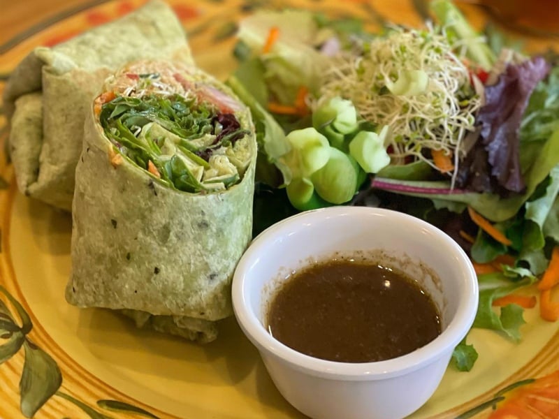 The veggie wrap with hummus, guacamole and fresh greens at Lotus Cafe and Juice Bar