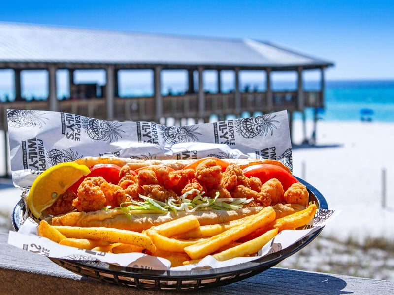 A shrimp poboy with french fries from Pineapple Willys