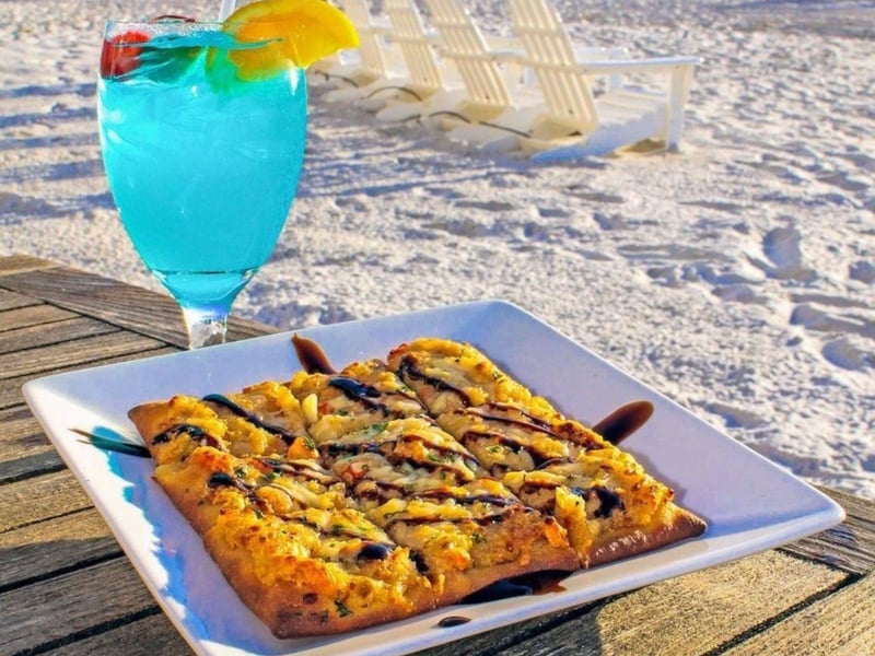 A flatbread and cocktail at Schooners in Panama City Beach, Florida