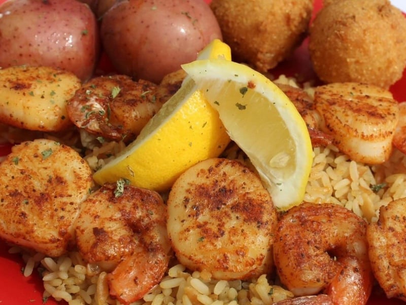 Fresh shrimp with rice and hushpuppies