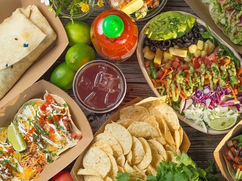 A burrito, nachos and a burrito bowl from Finns Island Style Grub