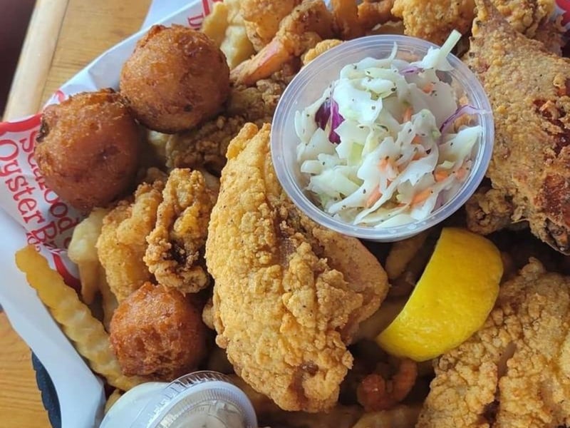 Fried fish with hushpuppies and fries