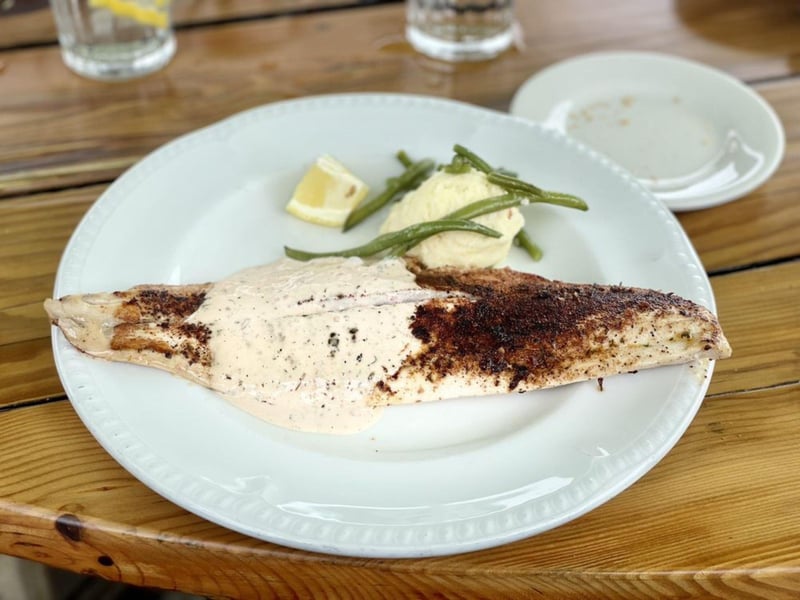 Blackened redfish with Meuniere sauce