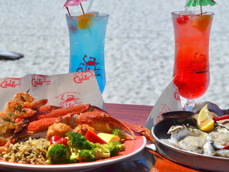 Two entrees and cocktails at The Crab Trap