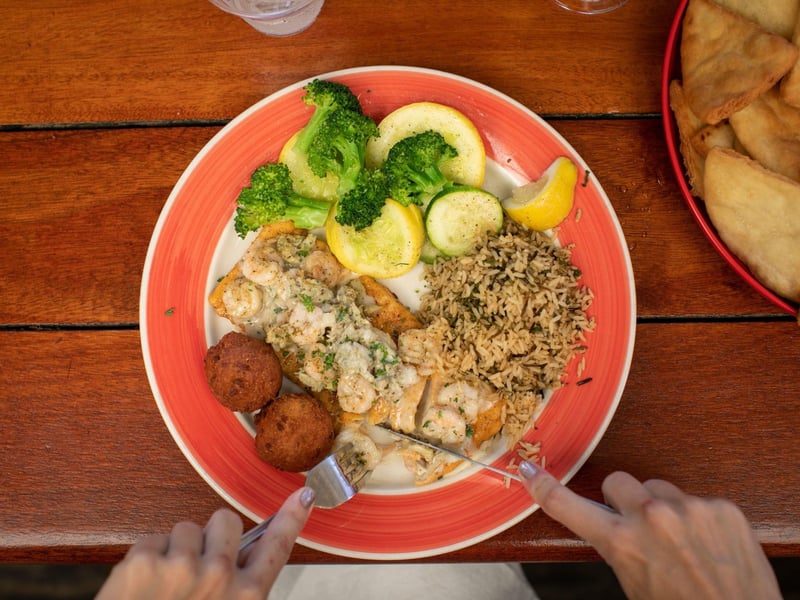 Crab trap mahi mahi with confetti rice and a vegetable medley