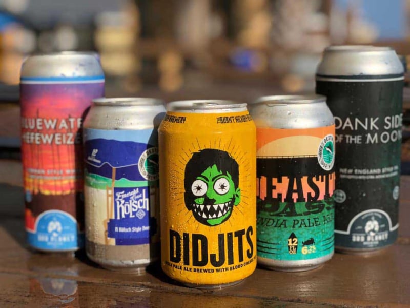 Local brewery cans at The Shack