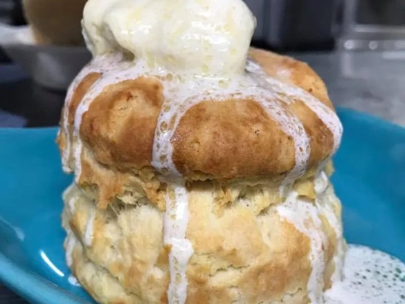 A fresh biscuit with honey butter at Asiagos Skillet in Fort Walton Beach, Florida