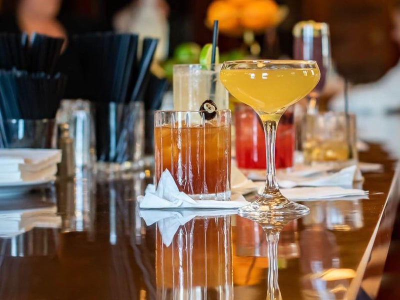 Cocktails at the bar at The Owl Cafe in Apalachicola, Florida