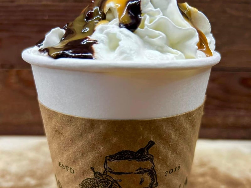 A coffee drink with whipped cream at Apalachicola Chocolate and Coffee Comapny in Apalachicola, Florida