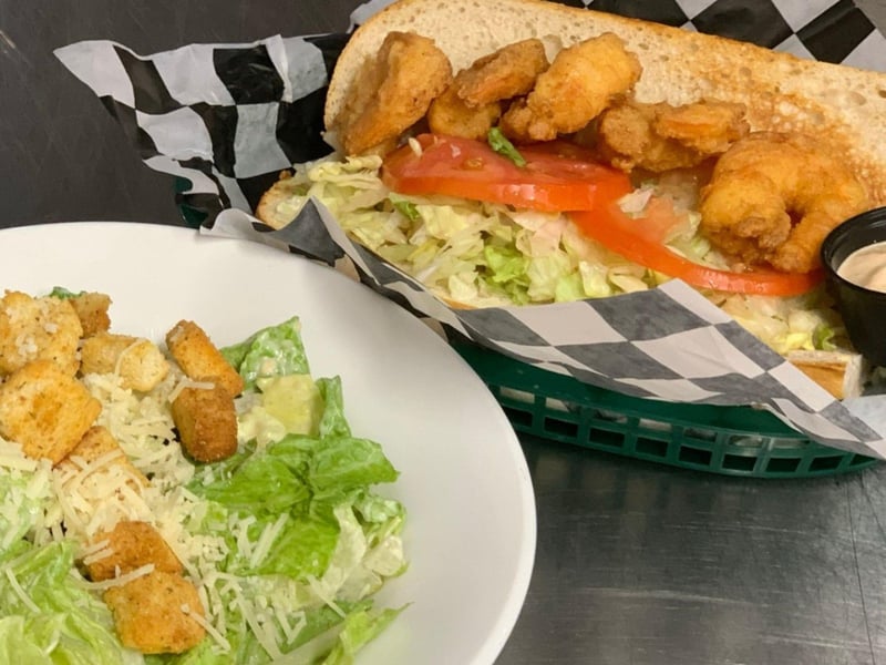 The shrimp poboy with a caesar salad at LongBills
