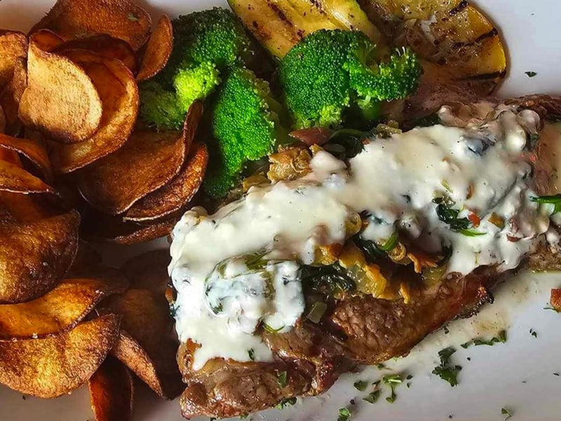 The parmesean steak frite with house chips