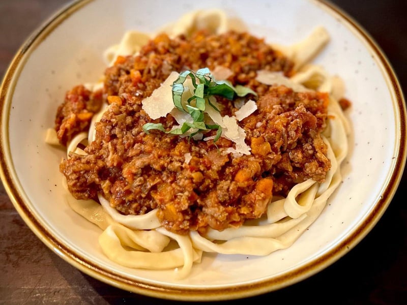 Fresh fettuccine noodles with Bolognese sauce
