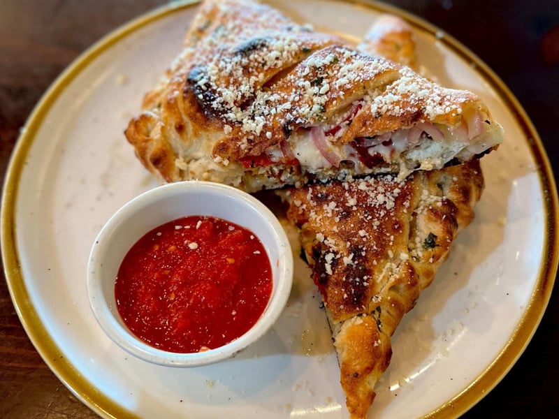 A calzone with mozzarella and ricotta