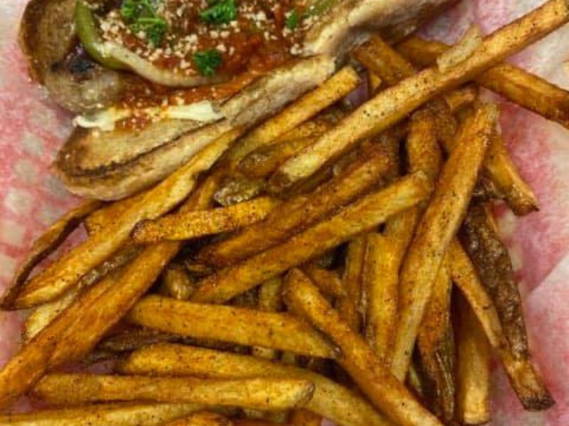 The Italian sausage po boy with fries