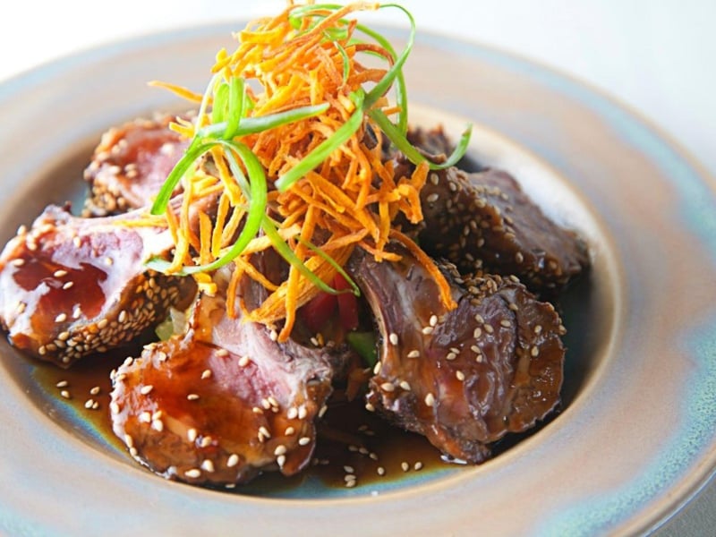 The oven roasted New Zealand lamb crusted with hoisin and sesame at Basmatis