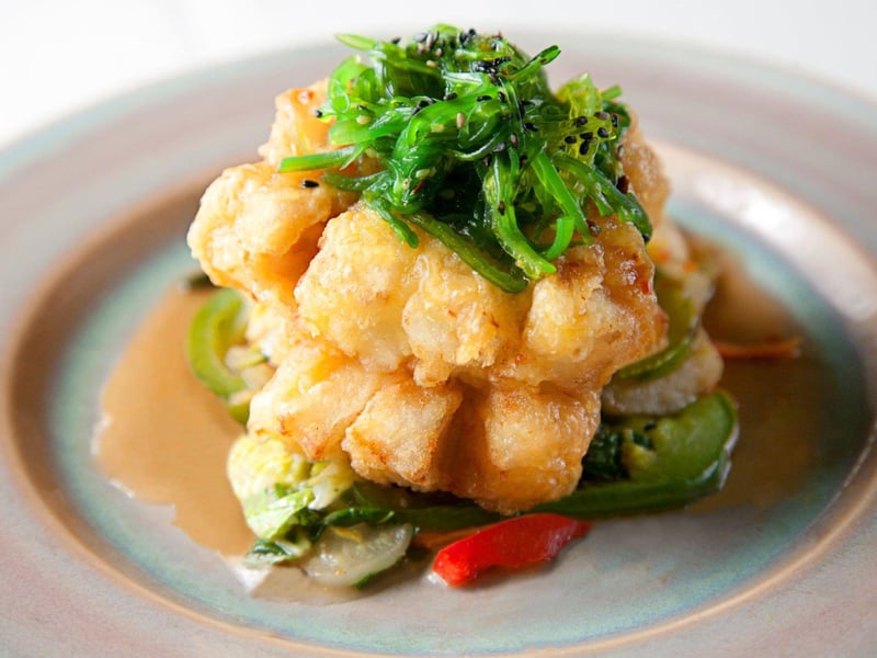 Local black grouper tempura fried with a spicy sweet  sour sauce from Basmatis Asian Cuisine