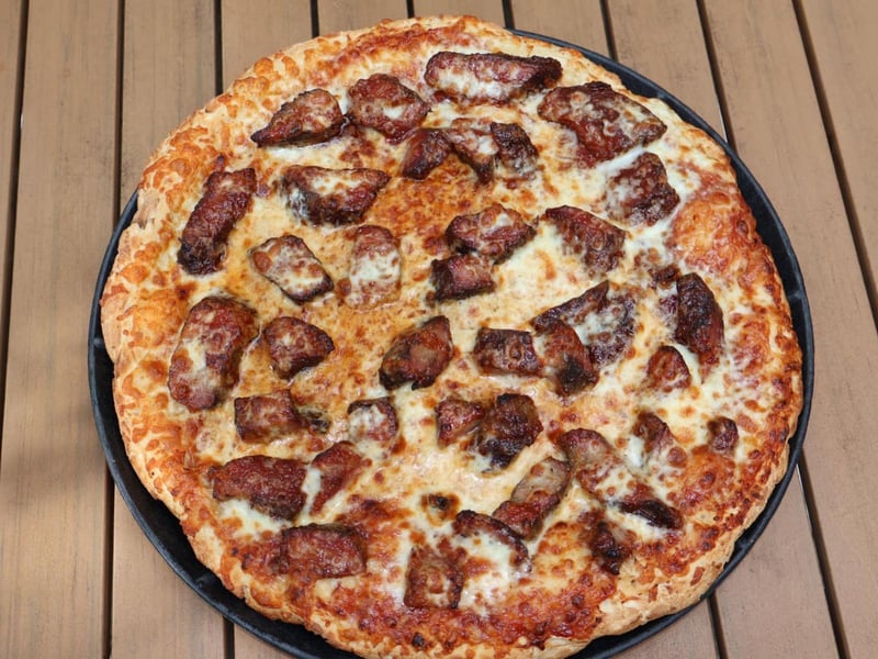 The Watersound beach pizza with housemade barbecue sauce