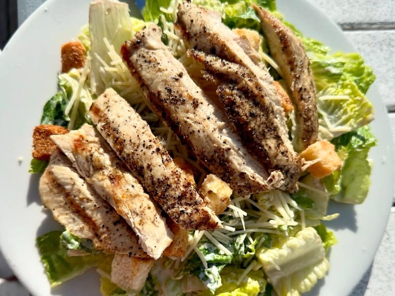 The Caesar salad with grilled chicken at Budy and Alleys Restaurant in Seaside, Florida