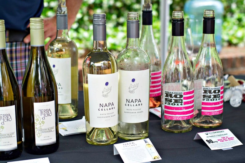 58928 Sandestinwinefestivalbottlesofwhitesandroses